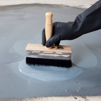 Why prime a surface before tiling it?